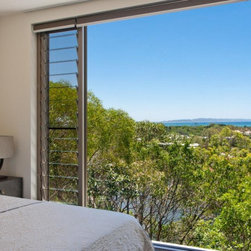Breezway Louvres next to fixed lite glass to help frame a few of beautiful Noosa - Windows
