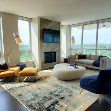 Neutrals and bright accent colours complement the view