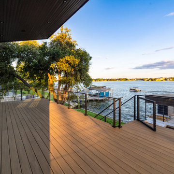 Modern Cantilevered Balcony with Steel Cable Railings and Lake Views