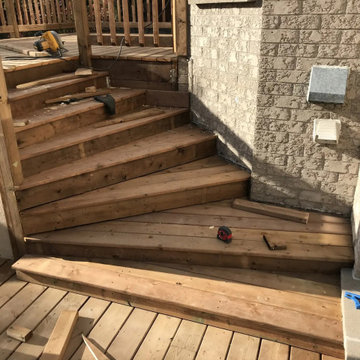 Deck stairs being built between levels in Markham