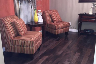 Transitional family room photo in Calgary