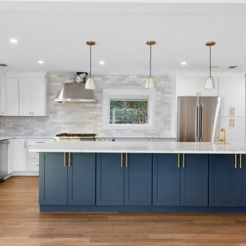 White Perimeter Kitchen with Navy Island