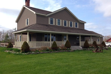 Inspiration for a farmhouse exterior home remodel in Other