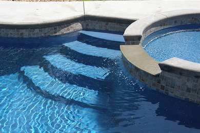 Inspiration for a backyard concrete and custom-shaped aboveground pool fountain remodel in Richmond