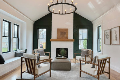 Large farmhouse light wood floor sunroom photo in Boston with a standard fireplace and a brick fireplace