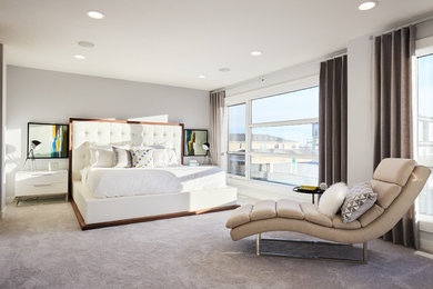 Example of a transitional bedroom design in Edmonton