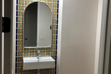 Inspiration for a rustic powder room remodel in Other