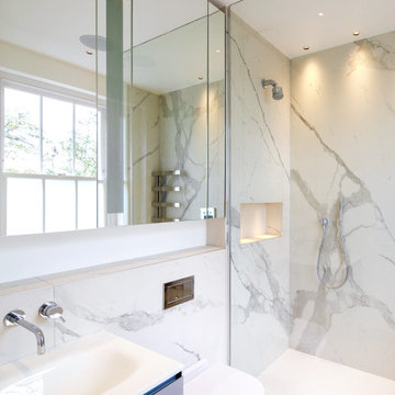 Contemporary ensuite with marble and shower