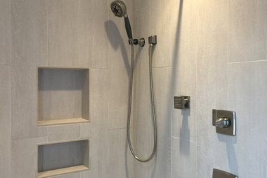 Inspiration for a mid-sized timeless 3/4 beige tile and porcelain tile ceramic tile alcove shower remodel in Phoenix with shaker cabinets, light wood cabinets, a two-piece toilet, beige walls, a drop-in sink and tile countertops