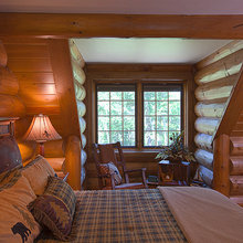 Log house bedroom