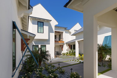 Beach style home design photo in Jacksonville