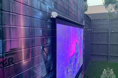 Photo of a modern home theatre in Melbourne.