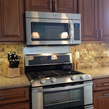 Kitchen with Scabas Stone Backsplash