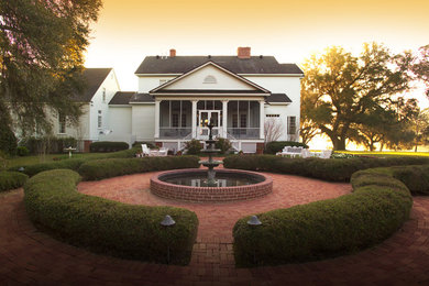 Large elegant white two-story wood house exterior photo in Atlanta