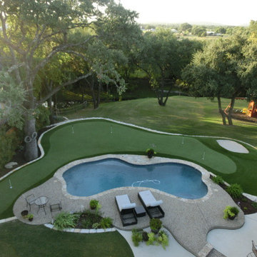 Boerne, Texas backyard putting green and stacked sod bunker