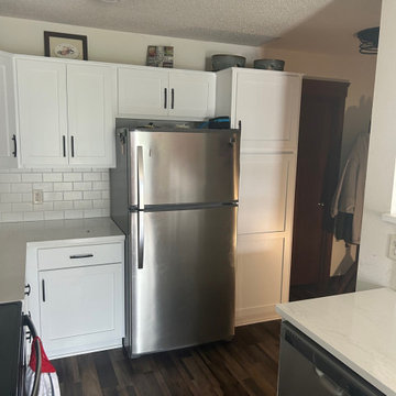 Kitchen Remodel with White Refaced Cabinets and Quartz Tops