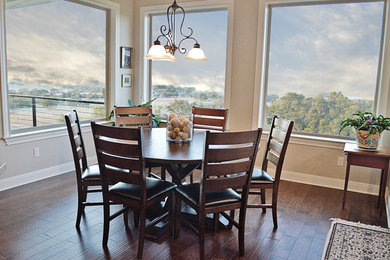 Inspiration for a mid-sized timeless dark wood floor enclosed dining room remodel in Austin with beige walls and no fireplace