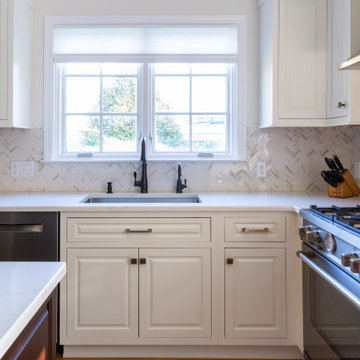 Mosaic Backsplash Compliments ORB Faucet