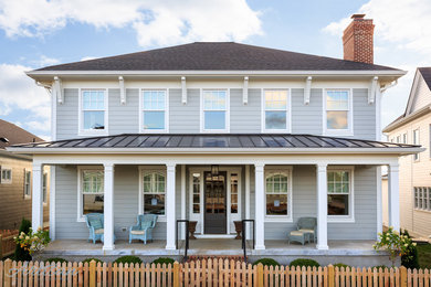 Mid-sized elegant two-story exterior home photo in Louisville