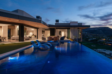 Inspiration for a modern one-story stone exterior home remodel