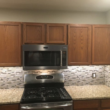 Kitchen Backsplash - Linear Mosaic and Glass with Santa Cecilia Granite Counter