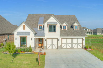 Mid-sized country white two-story mixed siding exterior home photo in Other with a shingle roof