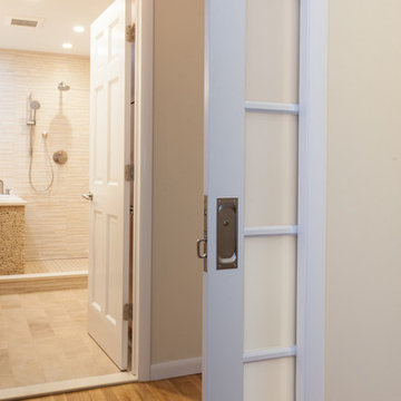 Frosted glass pocket door leads to this Zen Sanctuary
