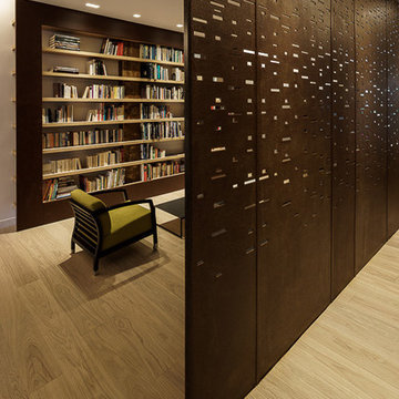 House renovation for a five member family, Library living room