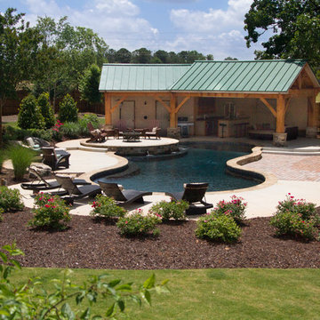 Backyard Transformation with Outdoor Kitchen & Waterfall