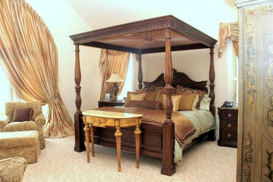 Inspiration for a timeless master carpeted bedroom remodel in Other with white walls