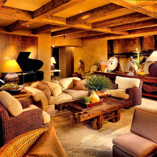 Large mediterranean enclosed living room in Los Angeles with travertine flooring.