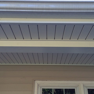 Charlotte, NC, upscale vinyl siding replacement by Belk Builders.