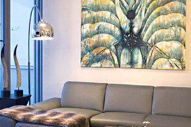 Example of a trendy living room design in Miami with beige walls