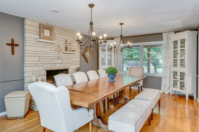This is an example of a transitional dining room in Wichita.