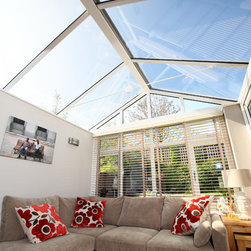 White Conservatory with PVCu Bi-Fold Doors - Products