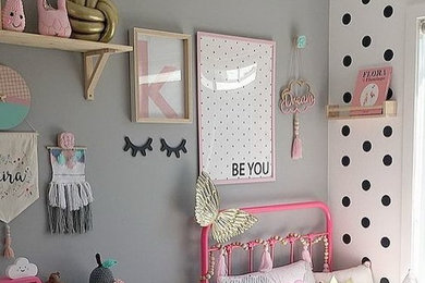 Kids' room - modern girl laminate floor kids' room idea in Brussels