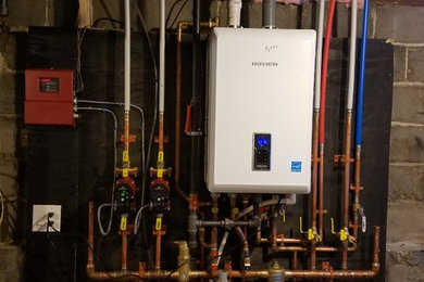 Navien NCB 240-E combination boiler with DHW installation @ 2 family residence