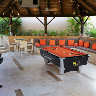 Medium sized modern open plan home cinema in Other with purple walls, travertine flooring and a projector screen.