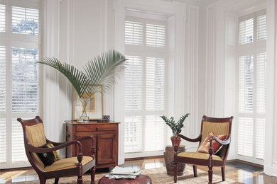 Example of a large beach style open concept medium tone wood floor living room design in San Francisco with white walls