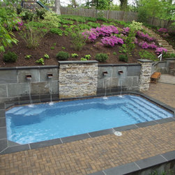 Pool with Bluestone Retaining Wall and Pavers - Landscaping Stones And Pavers