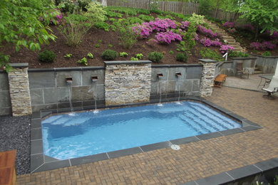 Pool with Bluestone Retaining Wall and Pavers