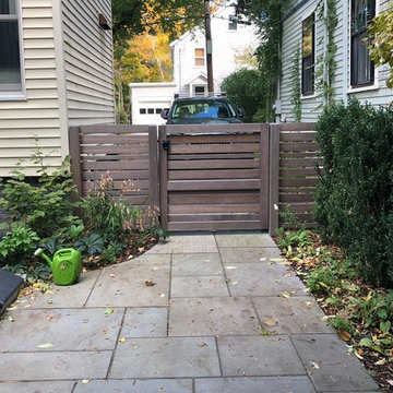 Gate between driveway and rear garden