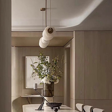 Parisian Minimalist Dining Nook with Natural Alabaster Vertical Pendant