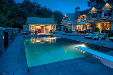 Design ideas for a traditional pool in Vancouver.