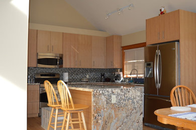 Example of a trendy kitchen design in Vancouver