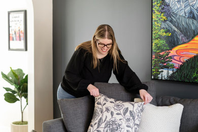 Inspiration for a modern light wood floor living room remodel in Calgary with gray walls