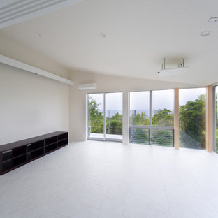 Inspiration for a small modern open plan home cinema in Other with white walls, lino flooring and a projector screen.