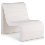 Meridian Furniture - Ivy Upholstered Accent Chair, Cream, Vegan Leather - Count on this Ivy cream vegan leather accent chair quickly becoming the most coveted seat in the house. Wrapped in soft vegan leather and adorned with a channel tufted design, its curved shape offers unparalleled comfort and support. Designed for the modern home, it effortlessly blends contemporary aesthetics with luxurious materials. Whether placed in a cozy corner or as a standout piece in your living room, this chair invites you to unwind in unparalleled elegance and enjoy a moment of tranquil indulgence.