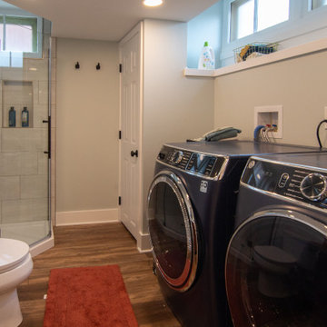 Bathroom/Laundry Room Using Warmer Tones, Accented by New Laundry Facility