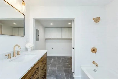 Bathroom - mid-sized modern kids' slate floor, gray floor and single-sink bathroom idea in Boston with flat-panel cabinets, brown cabinets, a one-piece toilet, gray walls, an undermount sink, quartzite countertops, white countertops and a built-in vanity